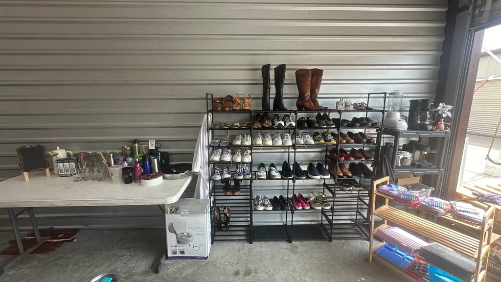 Shelves of shoes, kitchenware and household goods ready for wholesale